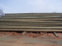 treated wooden poles