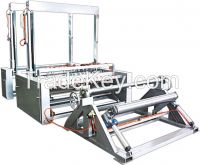 Gauze slitting and rolling machine