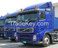 Corporate fleet of trucks and cranes for sale at reduced prices.
