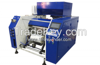 Fully automatic cling film rewinding machine